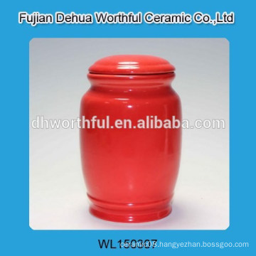 Brightly red ceramic storage tank